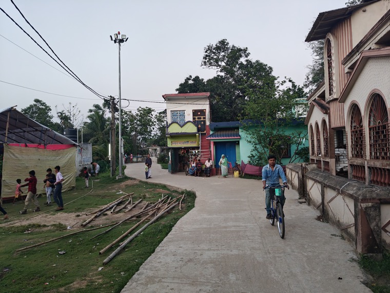Man with bicycle on election day, West Bengal
